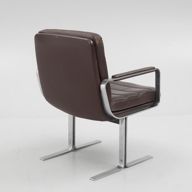 A steel and leather armchair, Collection Walter Knoll.