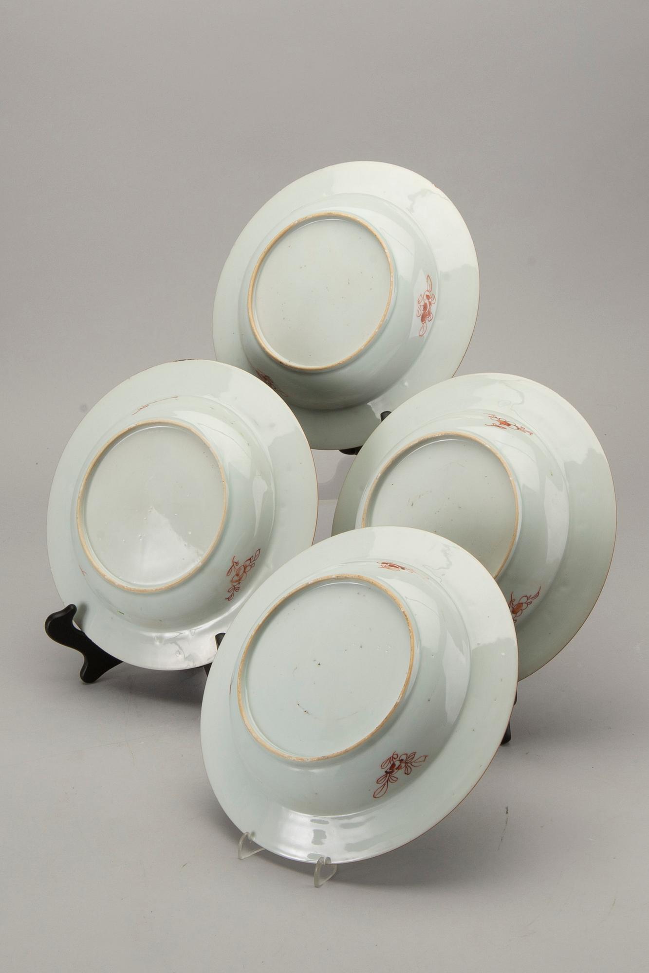 A set of four Chinese famille rose Qianlong porcelain plates.