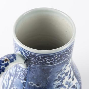 A large Japanese blue and white jug, 17th/18th Century.