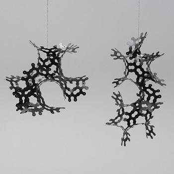 LARS ENGLUND, a pair of hanging sculptures, signed and dated 99.