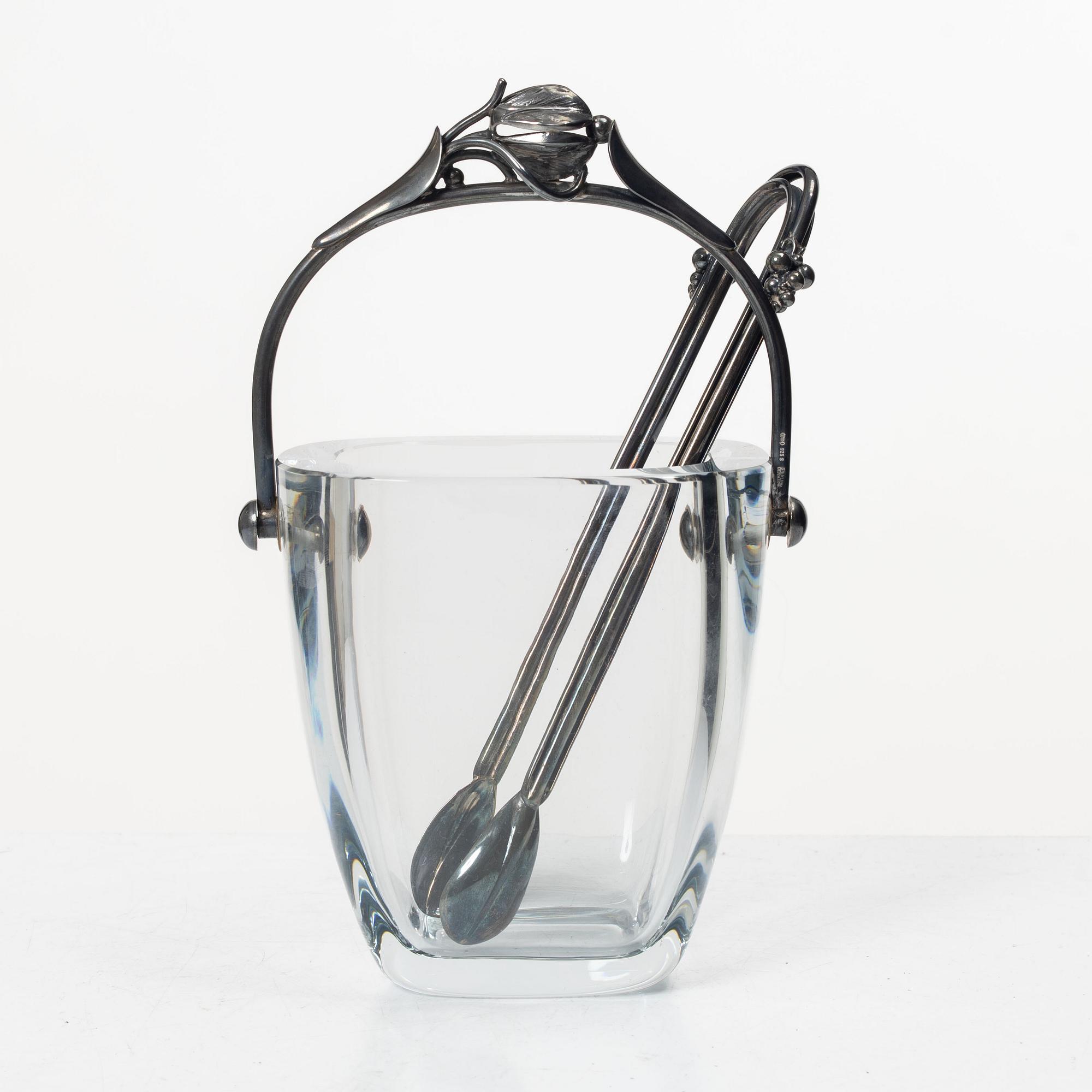 Ice bucket, glass, Strömbersghyttan, with mount and tongs in Danish silver, circa mid-20th century.
