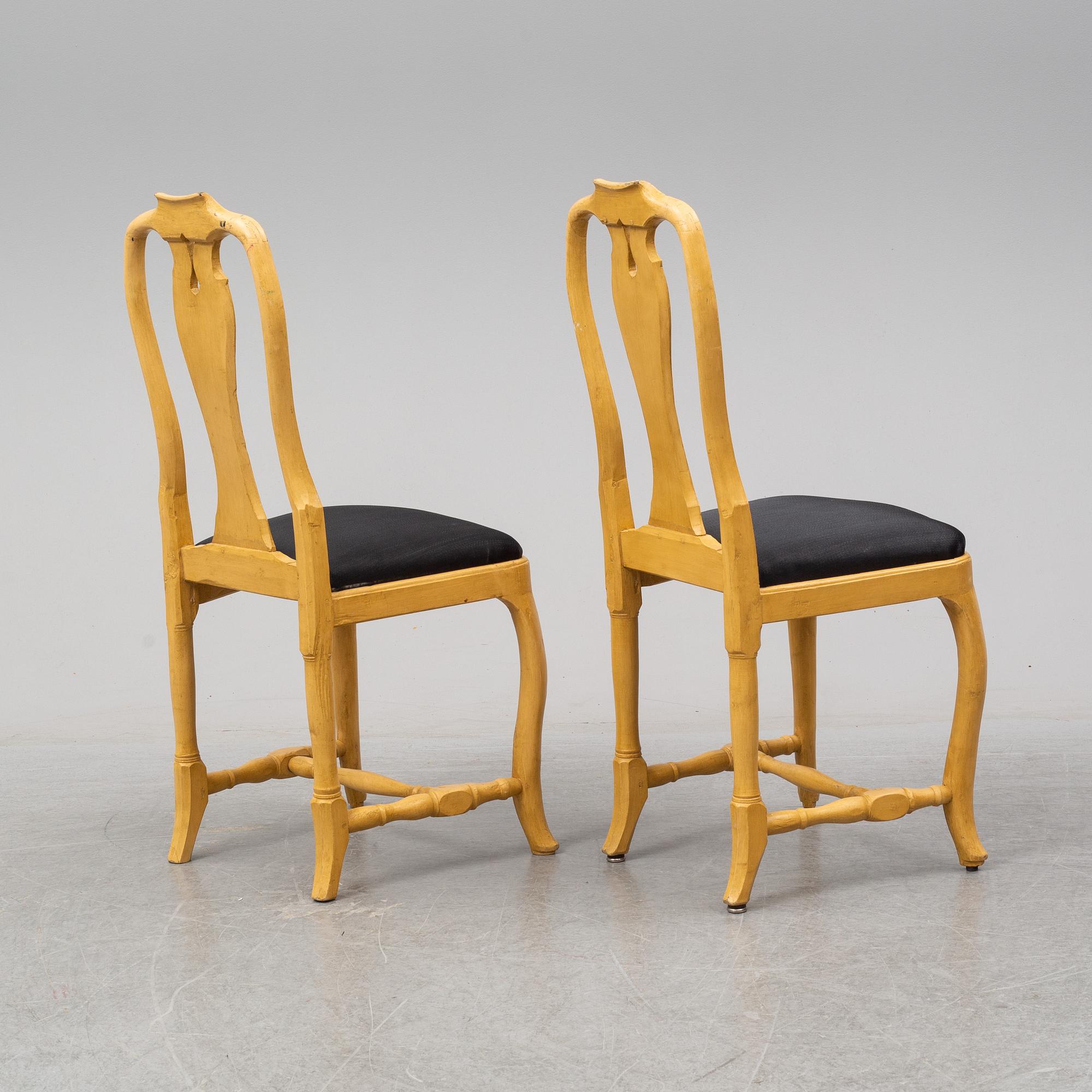 A mid 18th Century pair of rococo chairs.