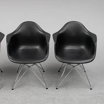 CHARLES AND RAY EAMES,  4  Eames Plastic Armchair, Vitra 2010.