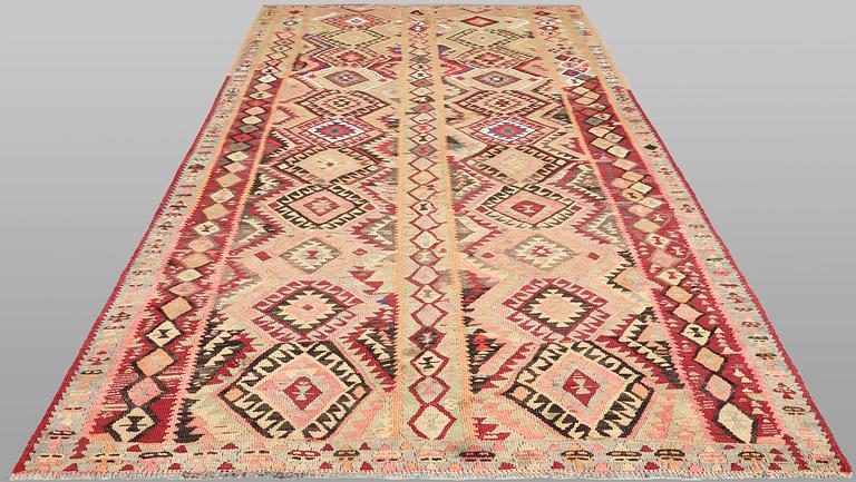 A Nomad Kilim rug, approx. 387 x 185 cm.