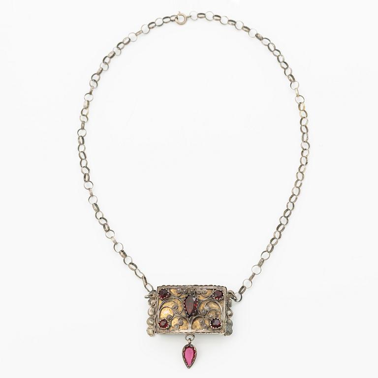 Costume jewellery, silver with glass stones.