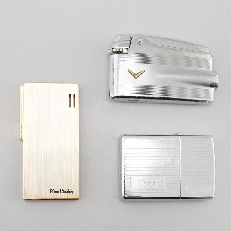 Three ligthers by Pierre Cardin, Ronson and Zippo and shopsticks and a scent bottle from Christofle.