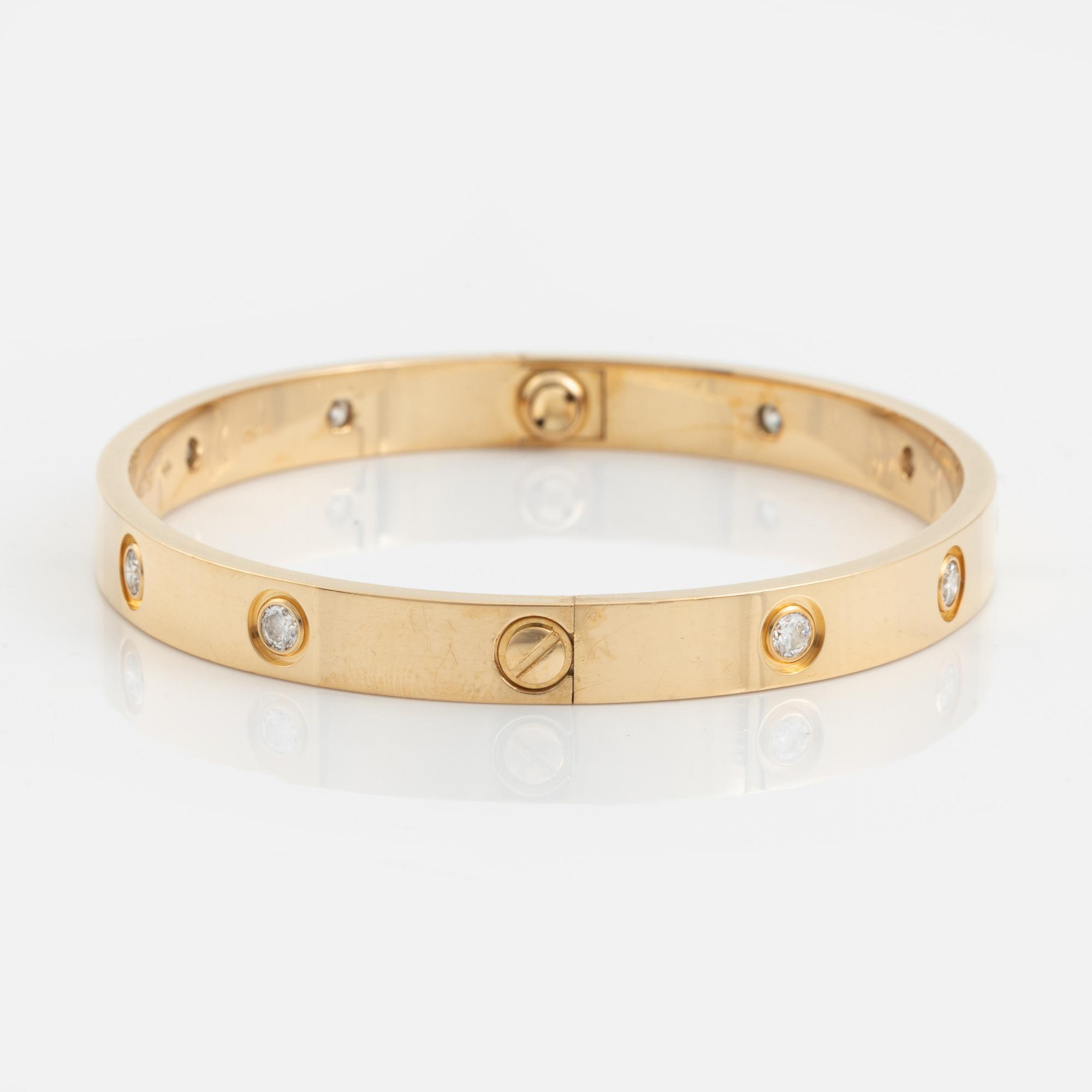 Cartier "Love" armband 18K guld med tio runda briljantslipade diamanter.