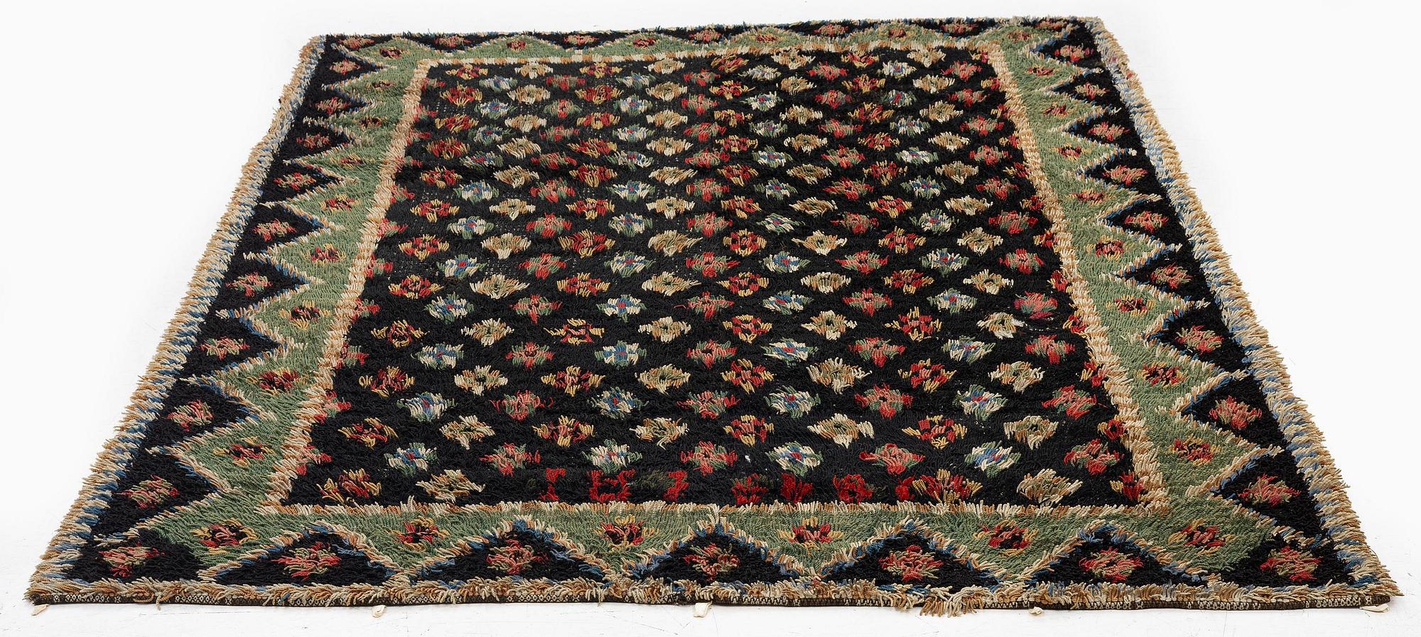 A Knotted pile (rya), c. 200 x 140 cm, Finland, dated 1849.