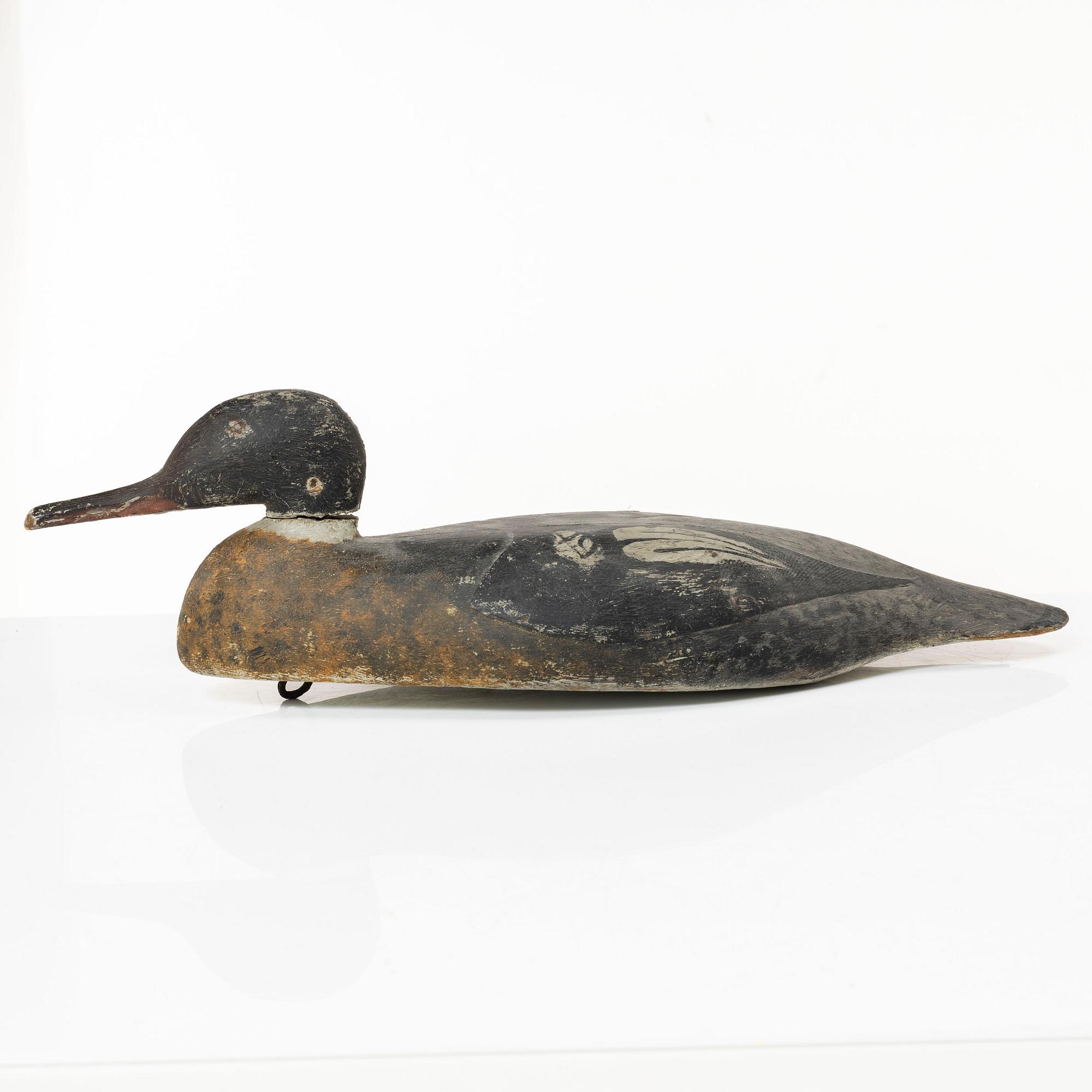 A pair of wood duck decoys, 20th century.