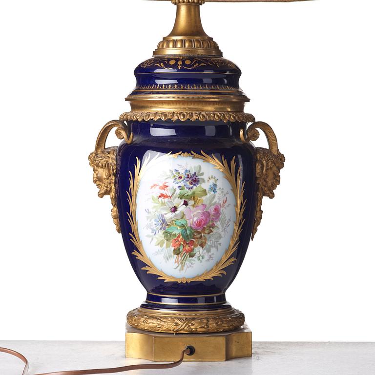 A French bronze mounted porcelain table lamp, late 19th Century, signed Thuilier.