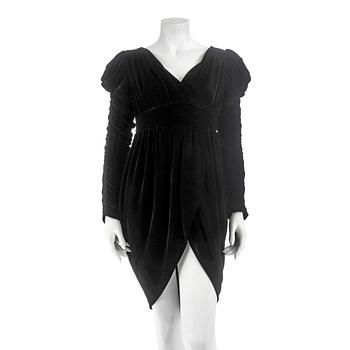 635. NORMA KAMALI, a black velvet dress. Size US 8.