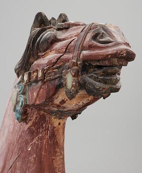 A large jade and agathe inlayed wooden carparisoned sculpture of a horse, presumably Ming dynasty.