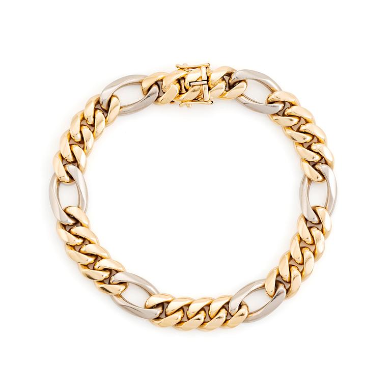 An 18K gold and white gold bracelet by Jan Hellströmer.