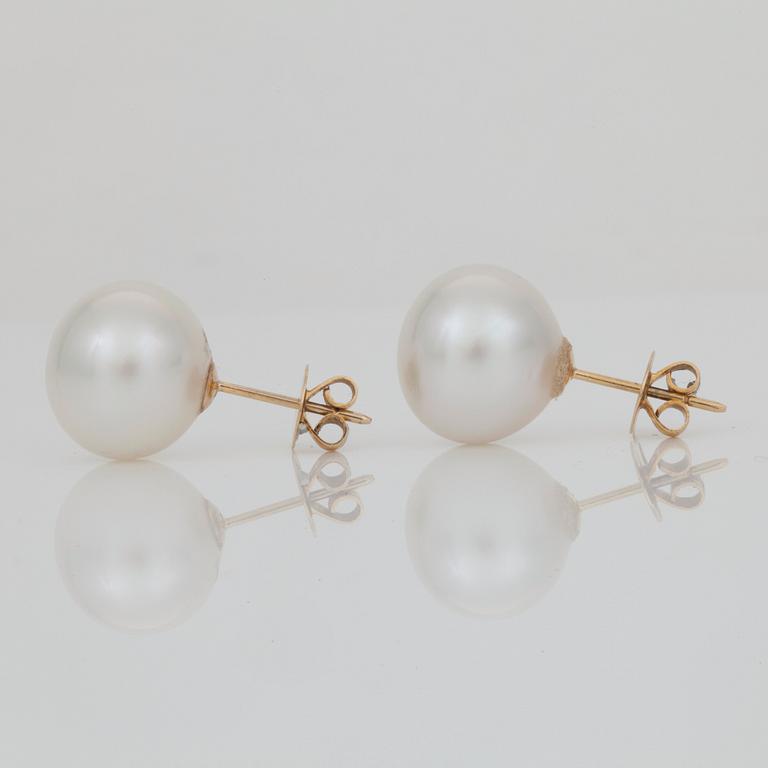 A pair of cultured South Sea pearl earrings.