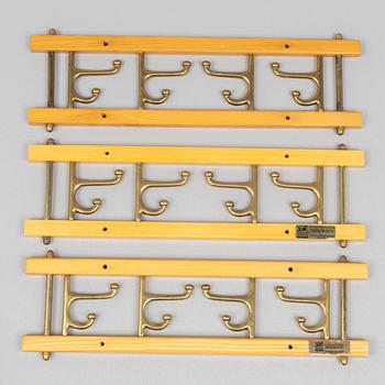 A set of three 'Dekorativ' coat hangers, Skoglunds metallgjuteri, Anderstorp, 1950s/60s.
