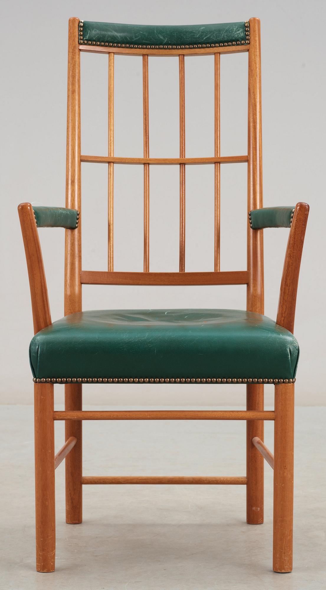 A Josef Frank mahogany and green leather armchair, Svenskt Tenn, model 652.