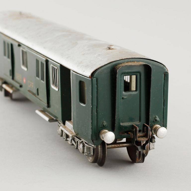 A 1940/50s model train set of 31 pcs in O-scale made by HAG, Switzerland.