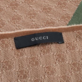 GUCCI, scarf and keychain.