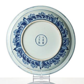 A large blue and white 'dragon' charger, late Qing dynasty/Republic with an apocryphal Yongzheng mark.