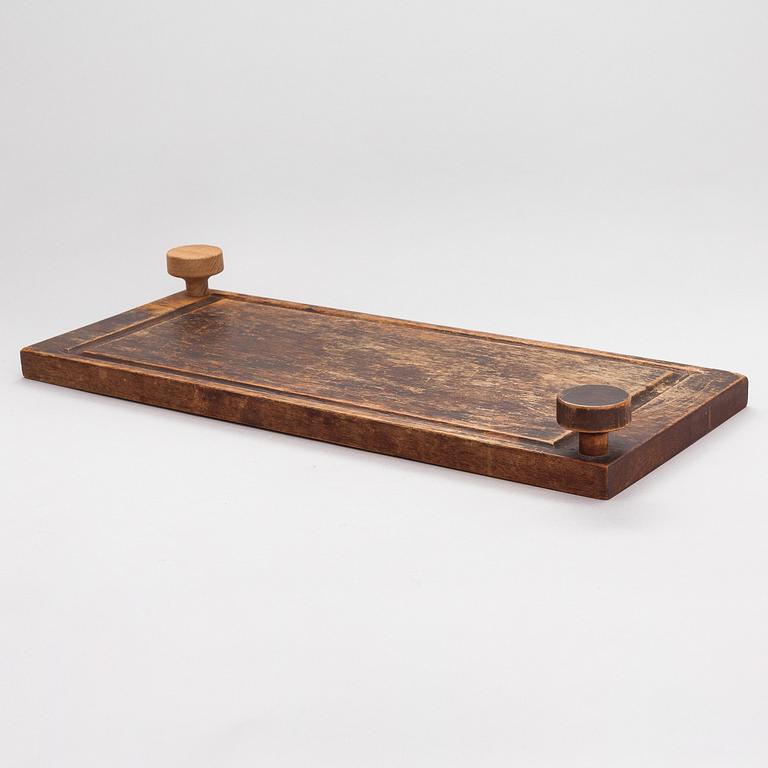 Bertel Gardberg, a serving board for Finnmade Gardberg, Norrmark handicraft.