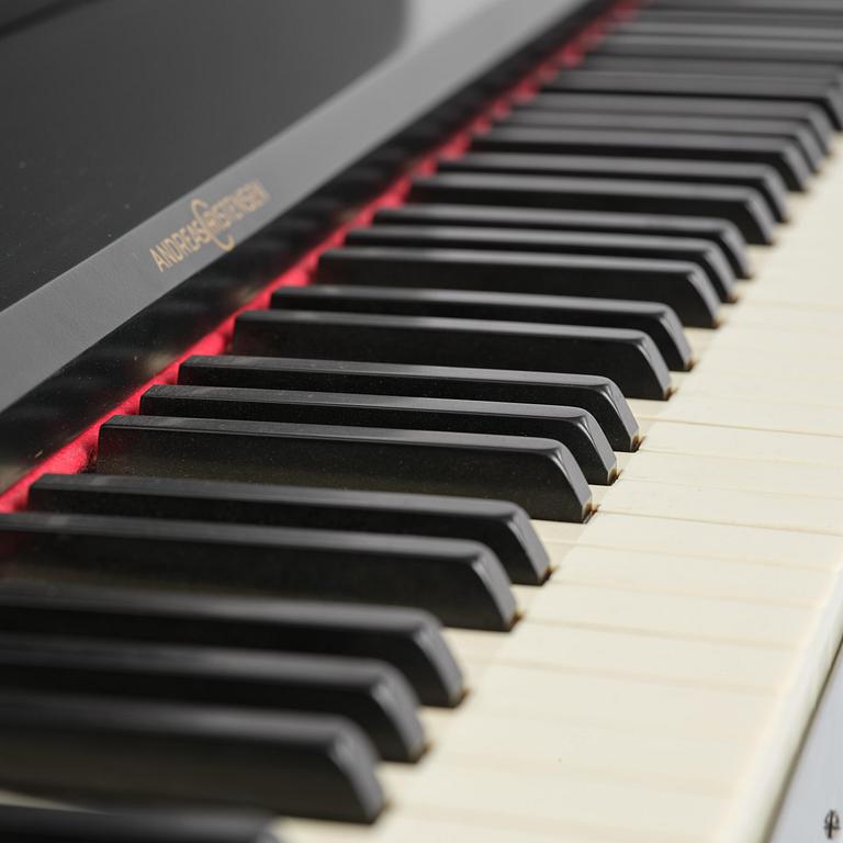 Poul Henningsen, a "PH Upright Piano", executed by Andreas Christensen, Denmark, 1940s.