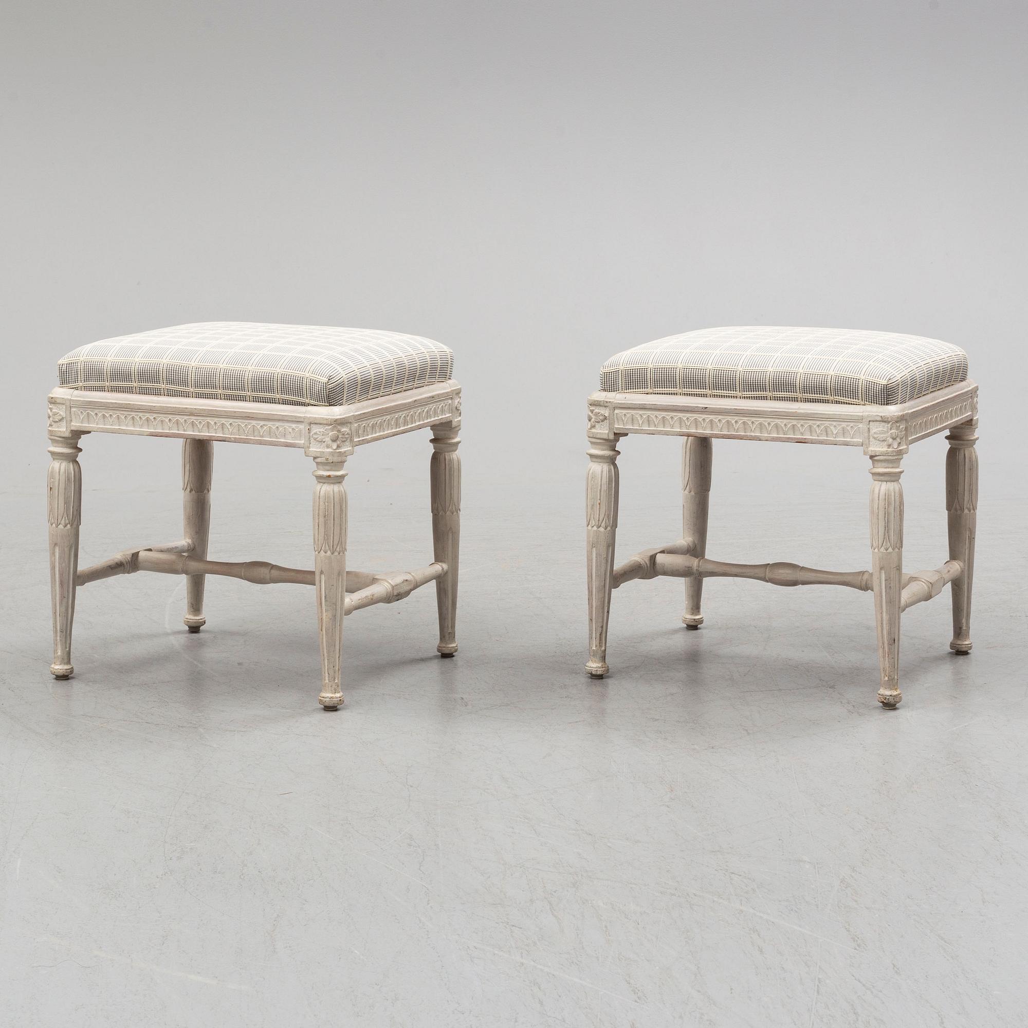 A pair of gustavian late 18th century stools by Erik Öhrmark (master in Stockholm 1777-1813).