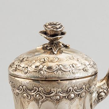 A rococo-style coffee pot, creamer and sugar bowl, swedish import mark, 20th century.