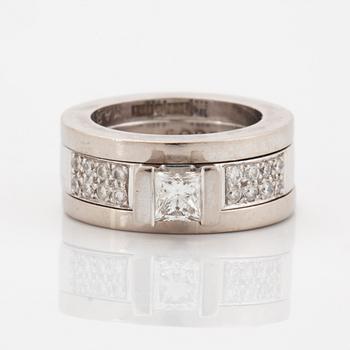 Rolf Karlsson, Three rings, 18K white gold with princess-cut and brilliant-cut diamonds, and two band rings.