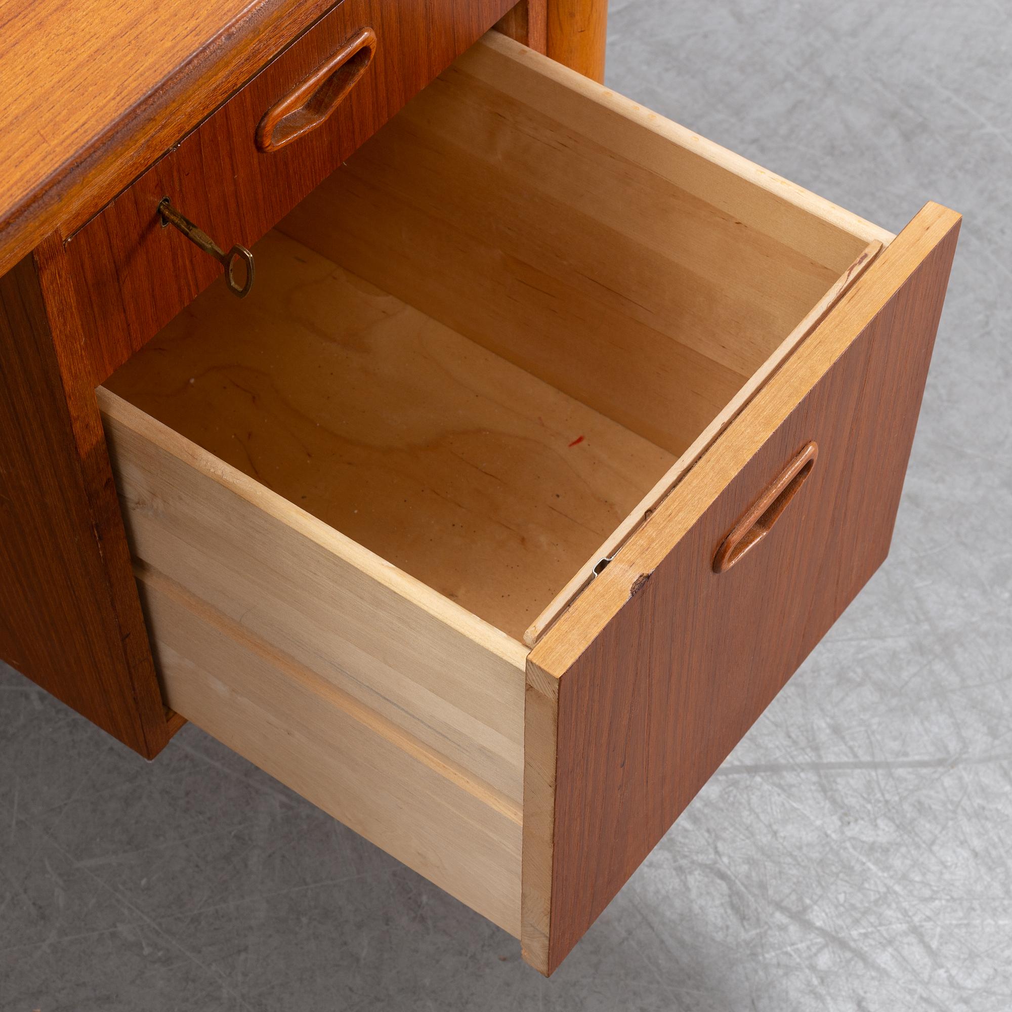 A 1950/60's oak and teak writing desk.