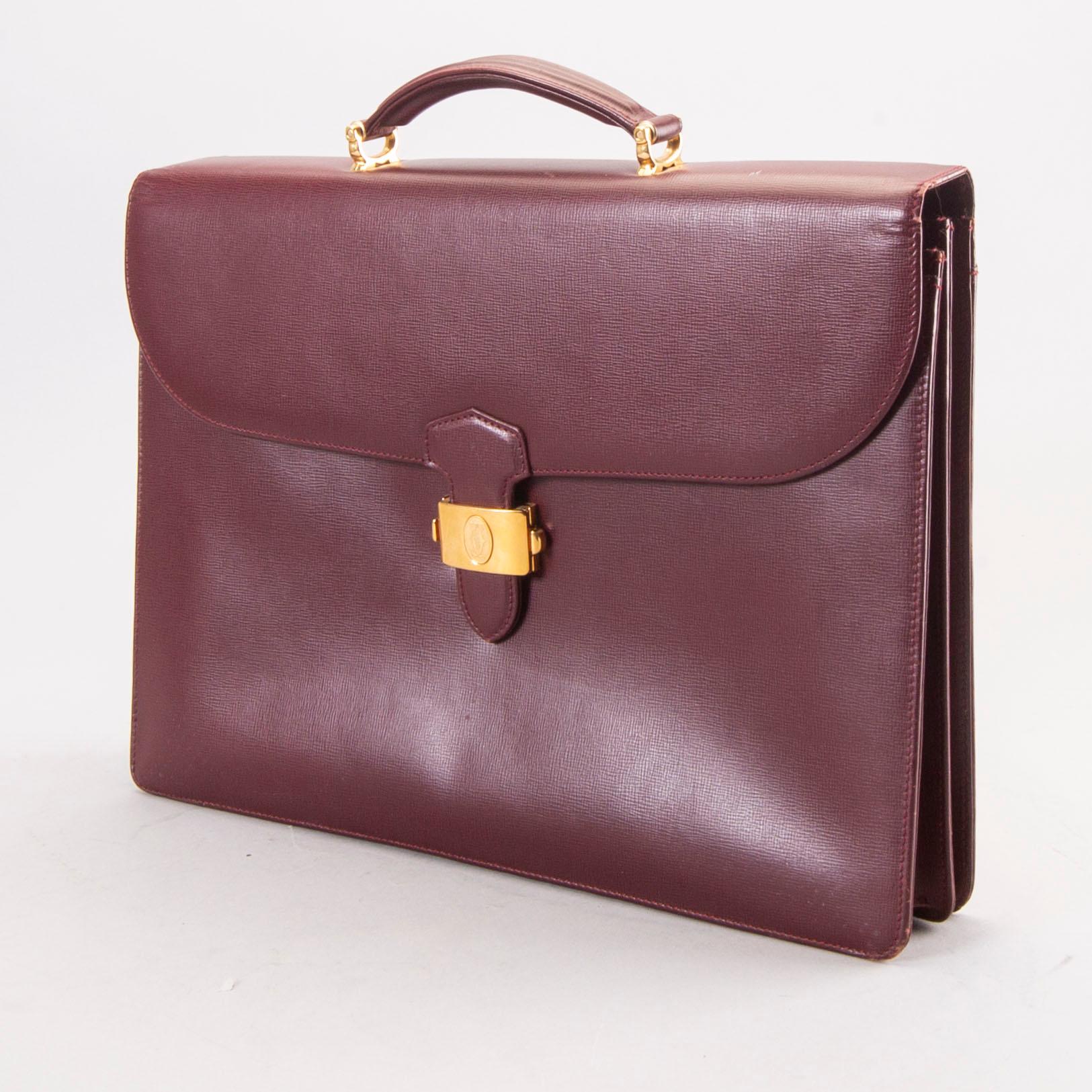 A Cartier leather briefcase.