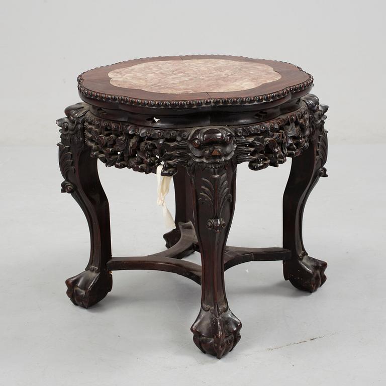 A Chinese hardwood table with marble top, 20th Century.