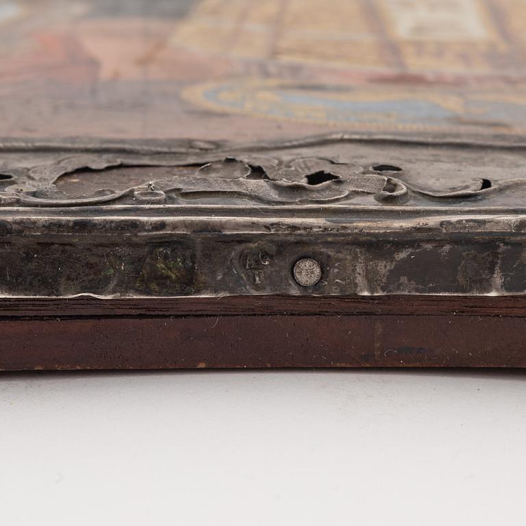 A silver and tempera on wood icon, Moscow 1776.