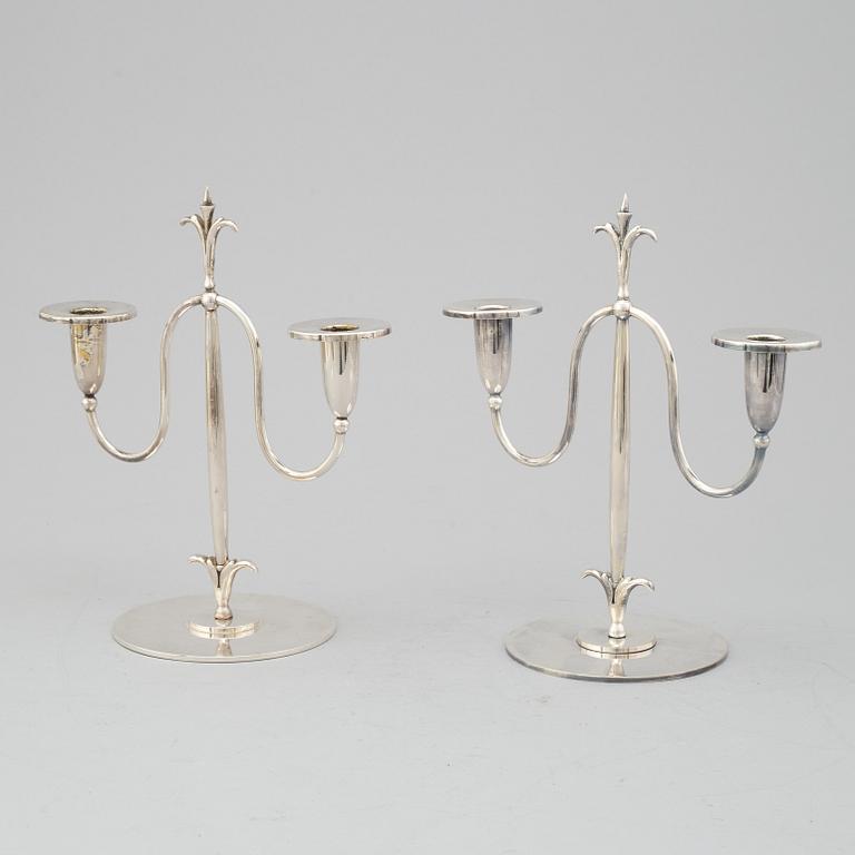 a pair of Elis Bergh silver plated candelabras, Swedish grace, CG Hallberg, Stockholm, 1920s.