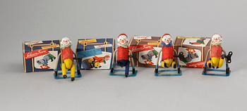 963. A set of four German Schucofigures.