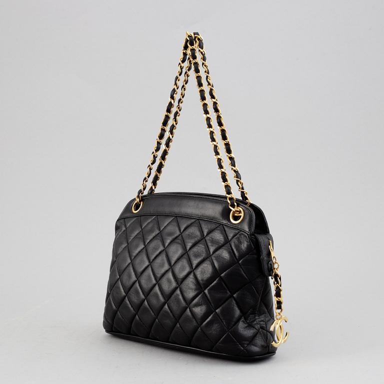 Chanel, a black quilted leather handbag, 1980's.
