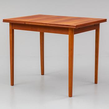 A 1950/60s teak veneered table.