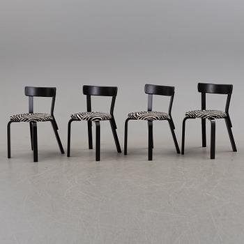 a dining table '81B' and four '69' chairs by Alvar Aalto, Artek.