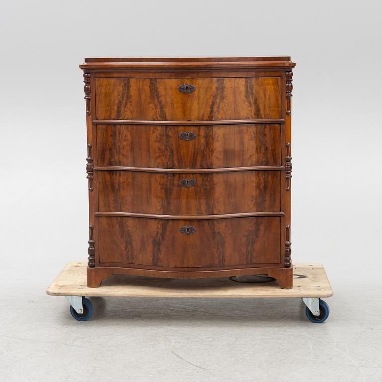 A chest of drawers, mid-19th Century.