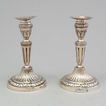 A pair of late 18th century silver candlesticks with unclear hallmarks, possibly from Germany. Weight ca 316 grams.