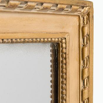 A late Gustavian style mirror, second half of the 19th century.