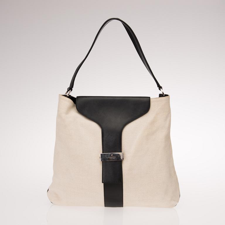 OFF-WHITE JUTE SHOULDER BAG.