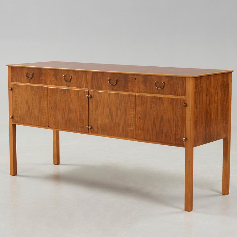 Josef Frank, A Josef Frank walnut and burrwood sideboard, Svenskt Tenn, before 1985.