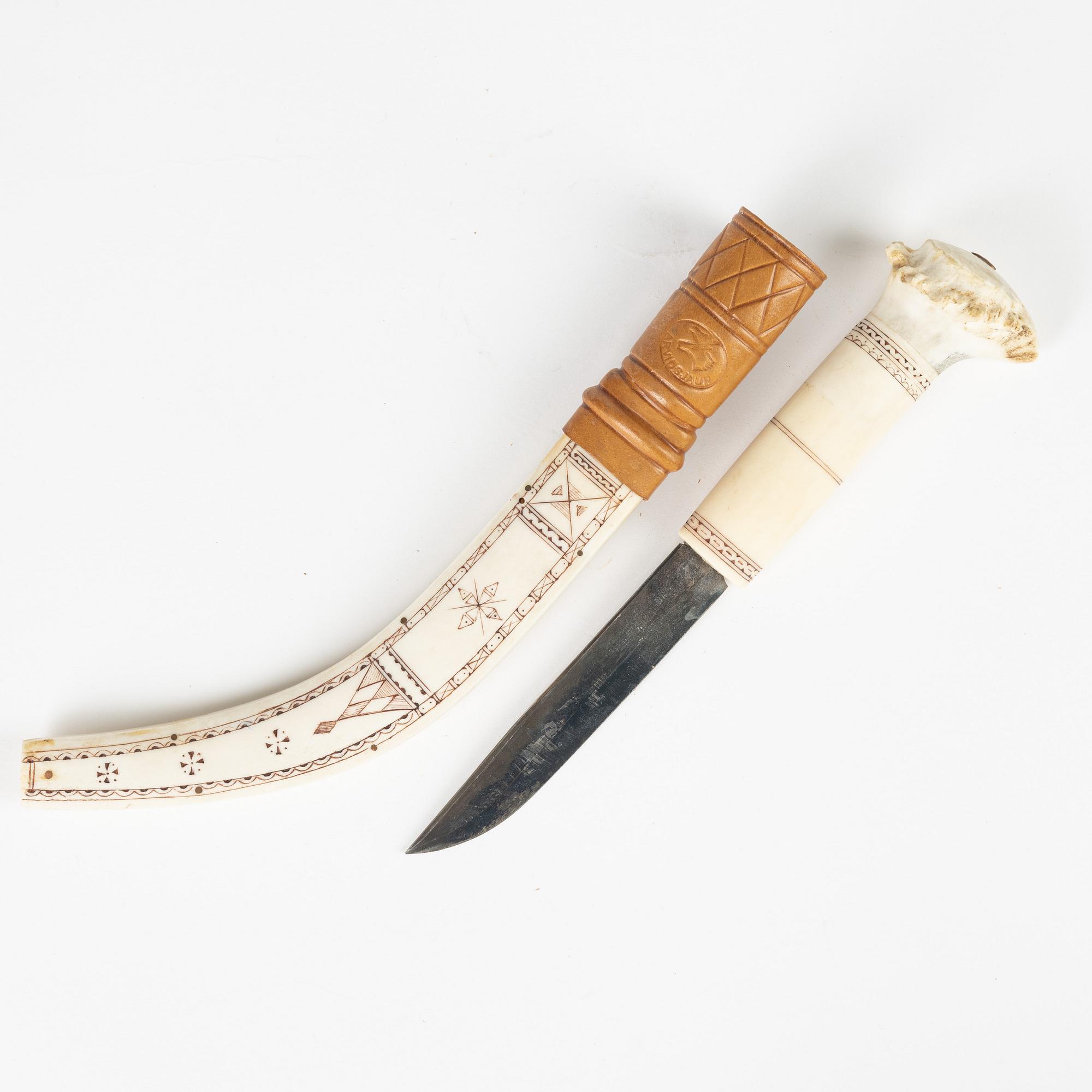 A reindeer horn knife by Carl Grahn, signed.