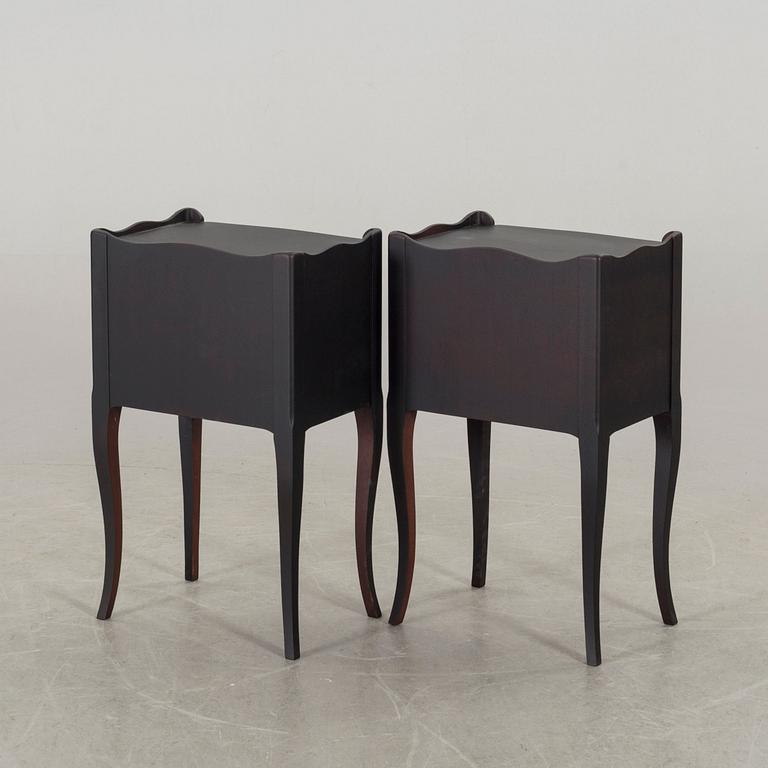 A pair of painted bedside tables, second half of the 20th Century.