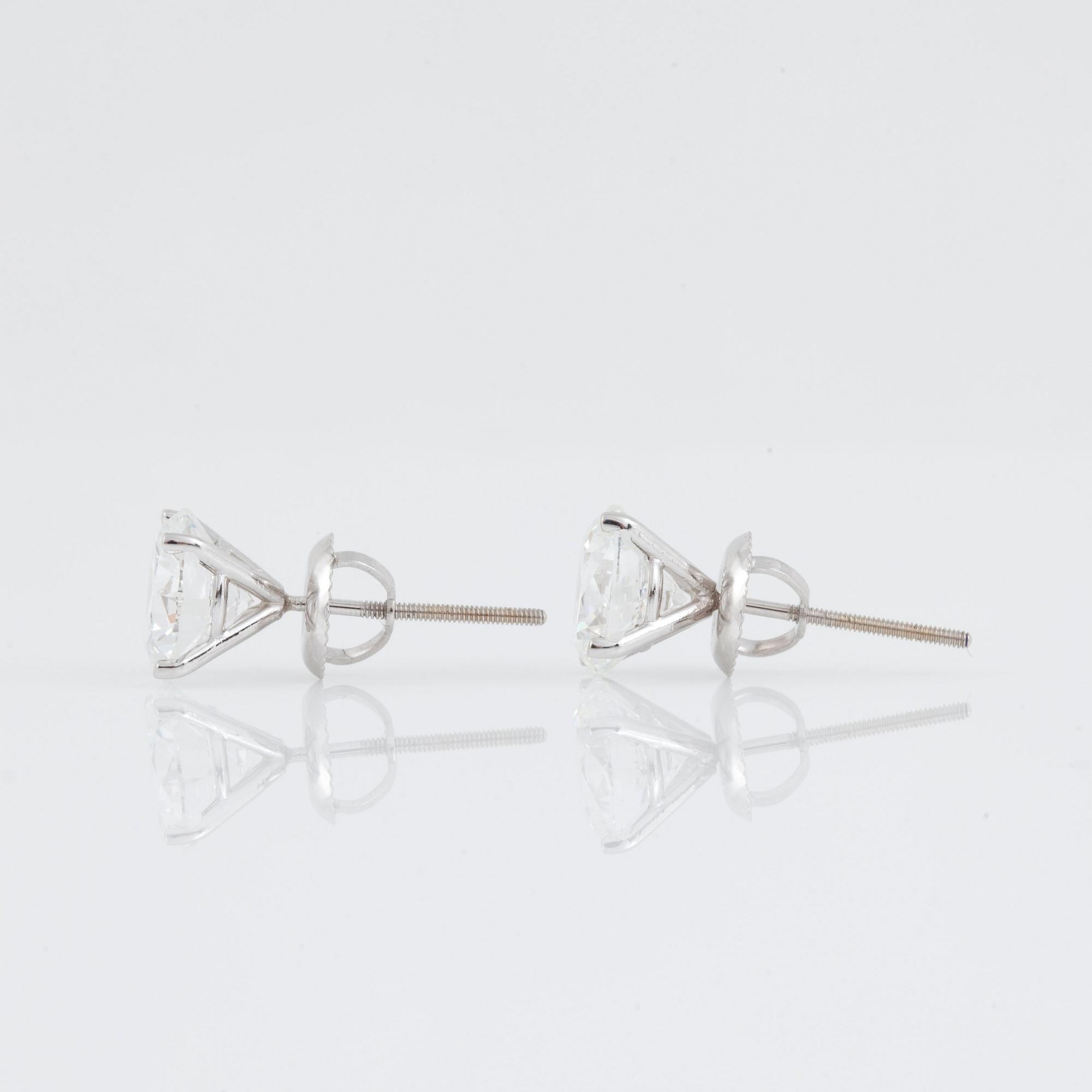 A pair of brilliant-cut diamond, circa 1.65ct / 1.73ct, F-G/VS, earrings.