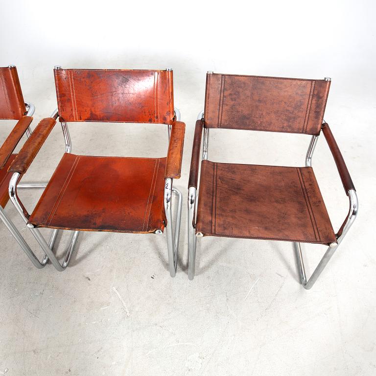 A matched set of four Matteo Grassi chrome and leather armchairs, late 20th Century.