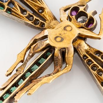 A brooch/pendant  in the form of a dragonfly with emeralds, rubies, sapphires and diamonds, Russia 1899-1908.