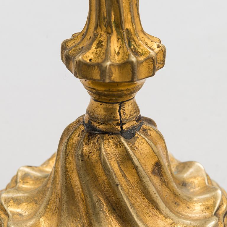 A pair of mid-18th century candlesticks France.