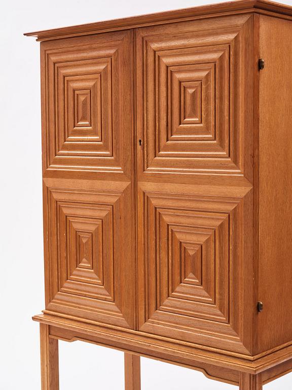 Oscar Nilsson, attributed to, a Swedish Modern oak cabinet, 1940s.