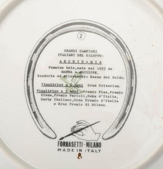A set of twelve Piero Fornasetti 'Grandi Campioni italiani del Galoppo' porcelain plates, Milano, Italy.